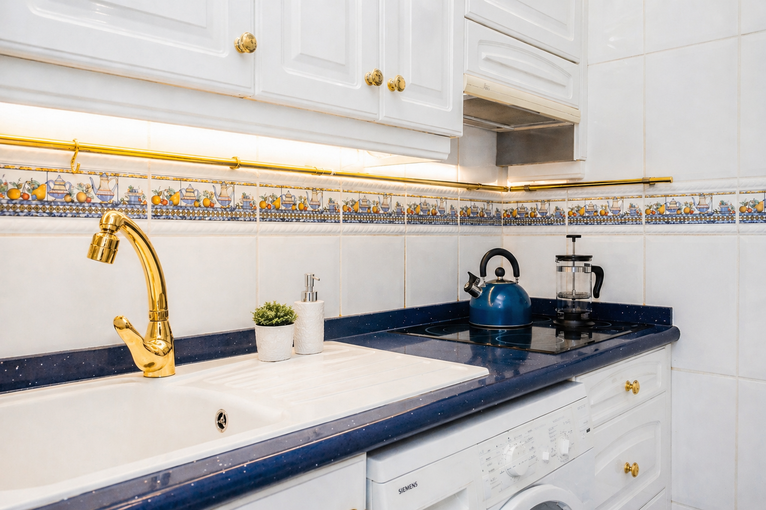 Brass detail & induction hob