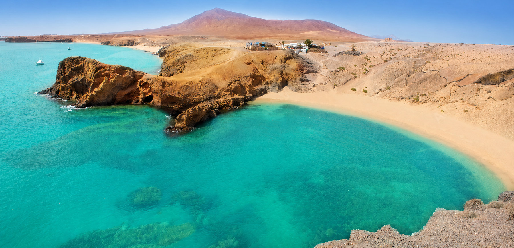 Playa de Papagayo with turquoise water and golden sand